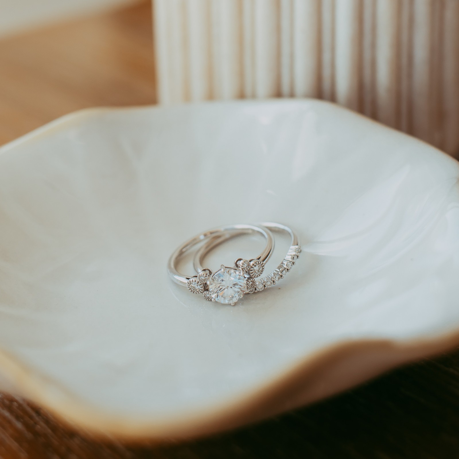 Rebecca Hook Mickey Mouse diamond engagement set displayed on a white dish