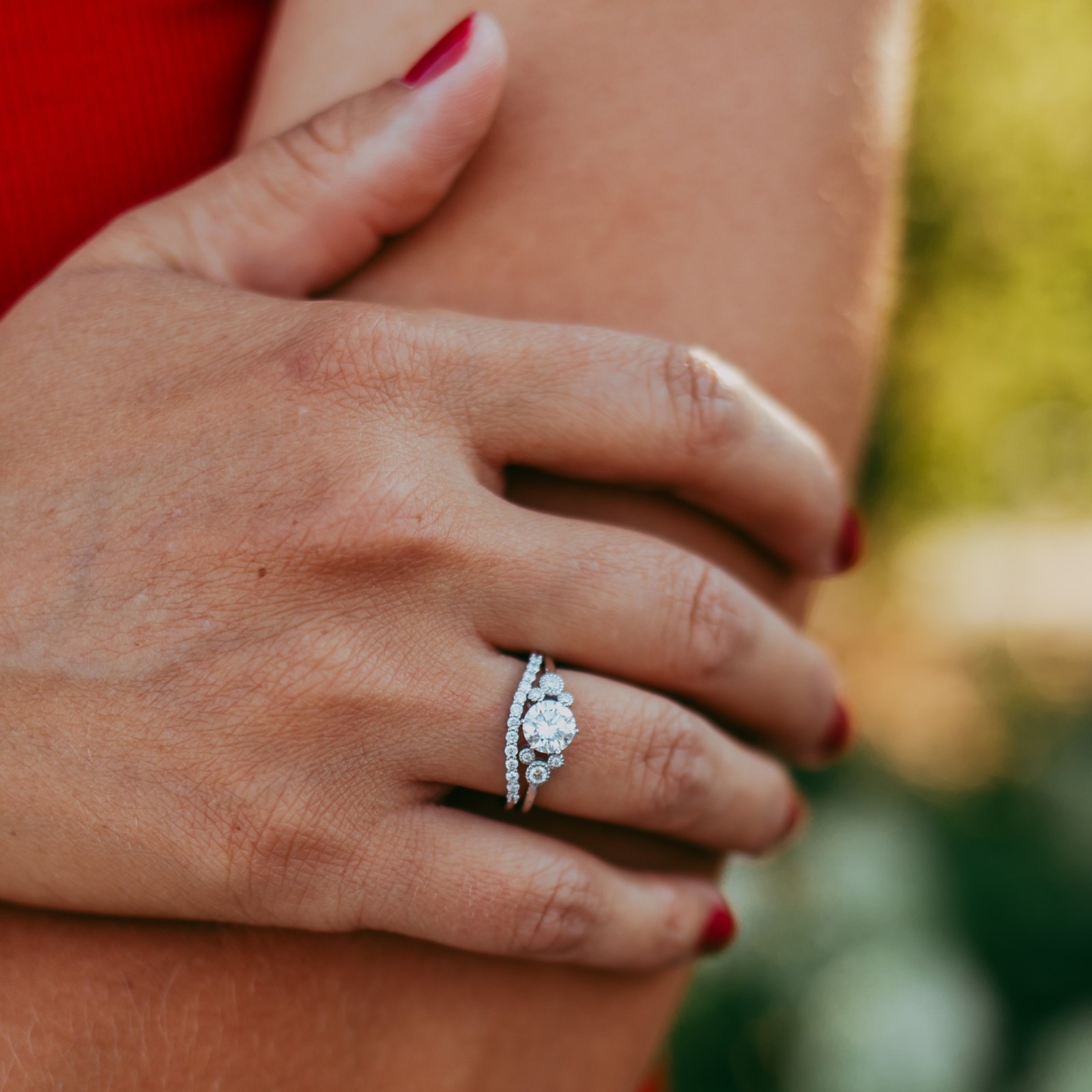 Rebecca Hook Mickey Mouse diamond engagement ring shown on a hand
