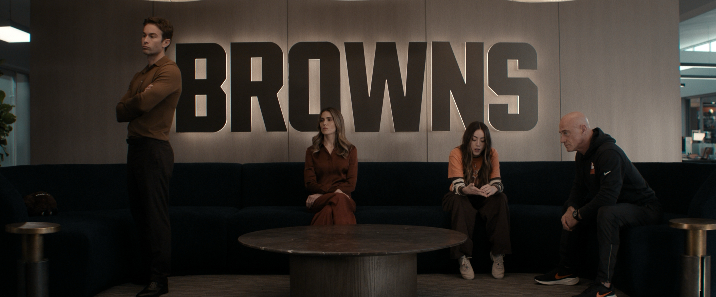 The Land cast members gather in a Cleveland Browns front office