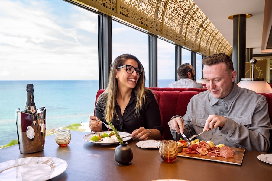 Adults dining at an adult-exclusive Disney Cruise Line restaurant