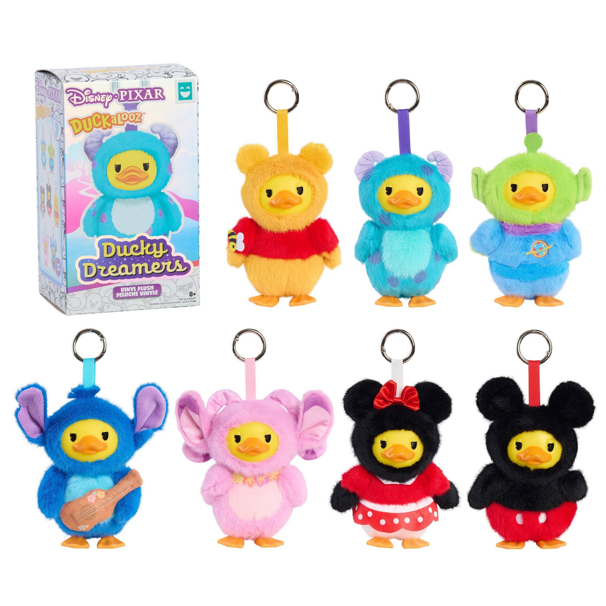Seven Disney and Pixar Duckalooz Ducky Dreamers plush clip-ons beside the blind-box package