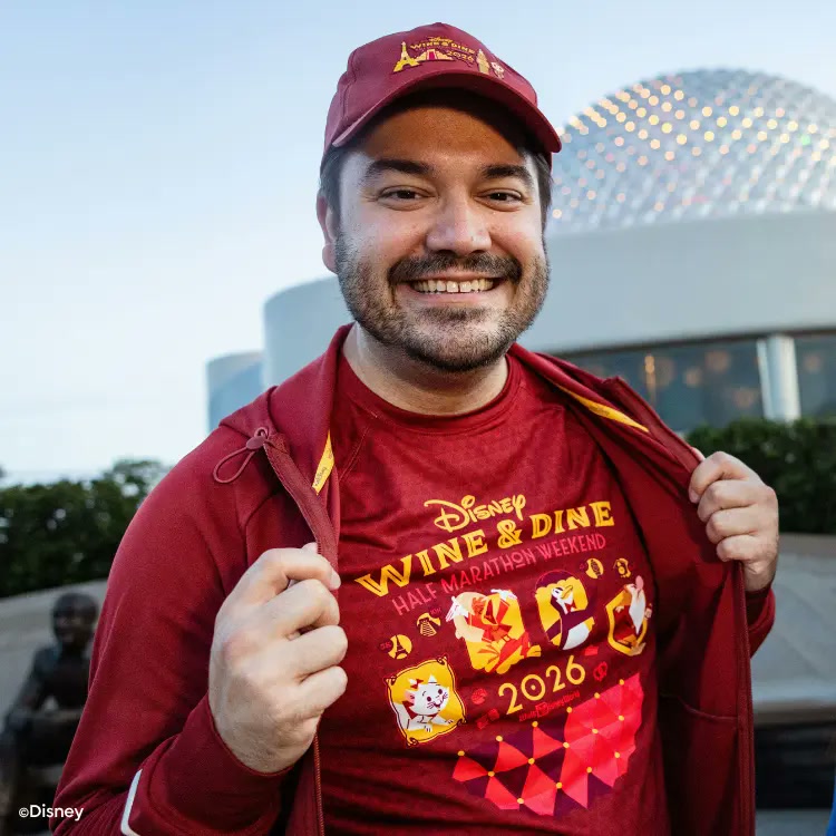 Runner wearing 2026 Disney Wine & Dine Half Marathon Weekend apparel in front of Spaceship Earth