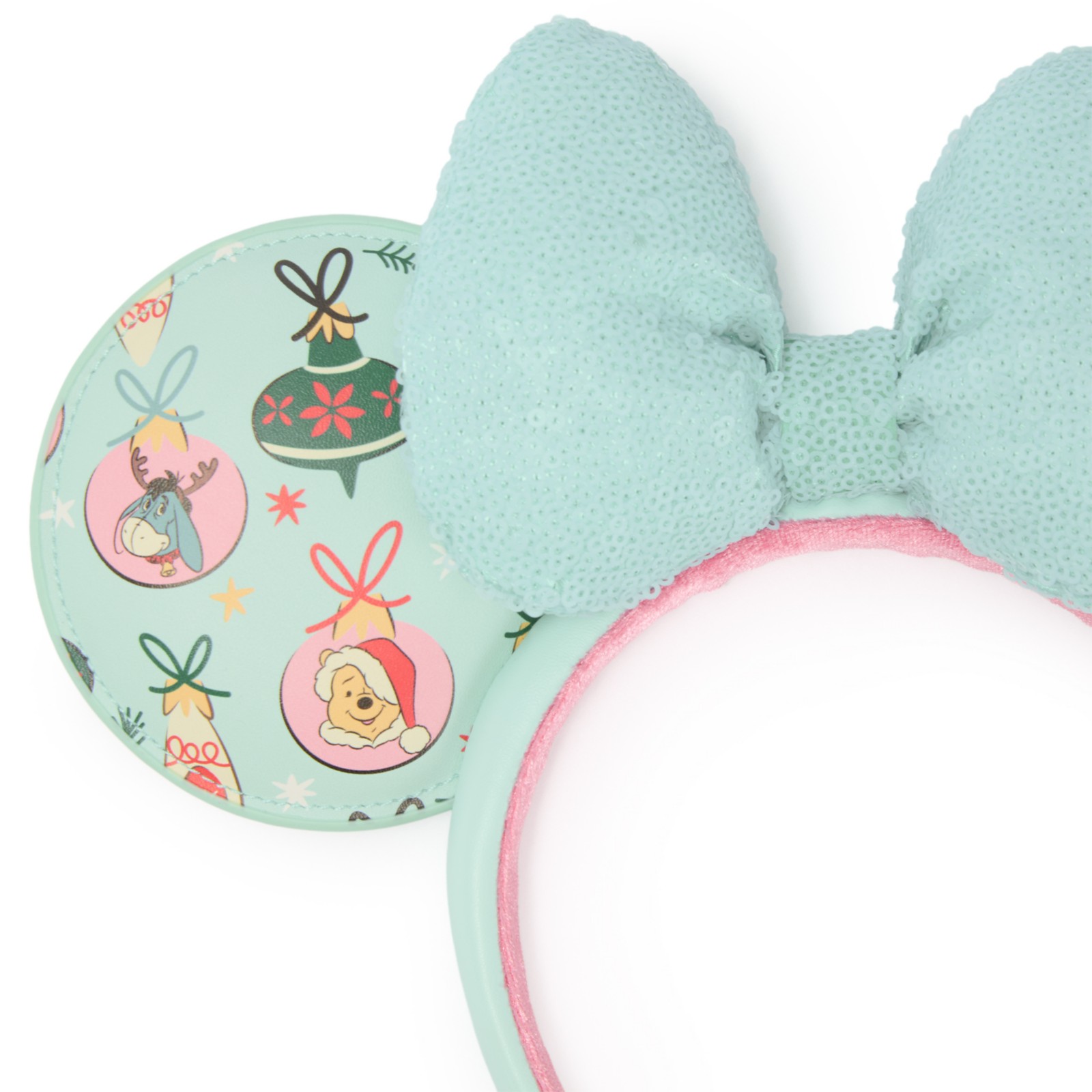 Close view of Pooh, Tigger and Eeyore ornaments on the holiday ear headband