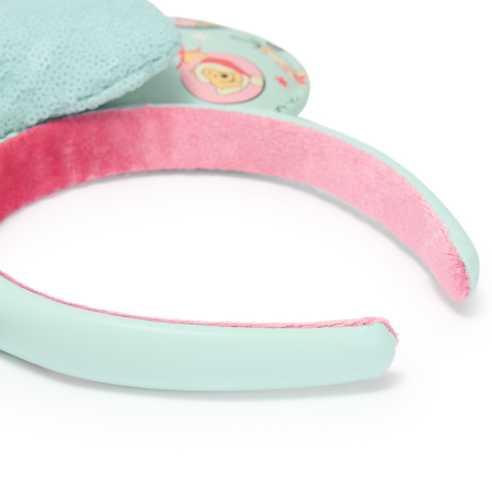 Pink non-slip interior of the Winnie the Pooh holiday ear headband