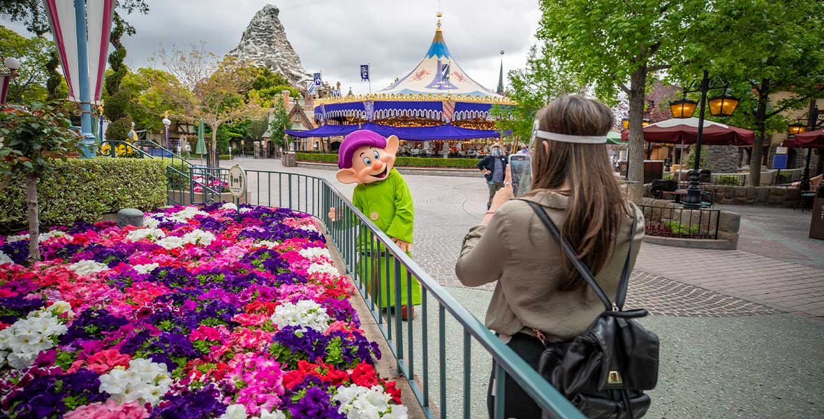 Disney Parks digital content team member filming Dopey at Disneyland