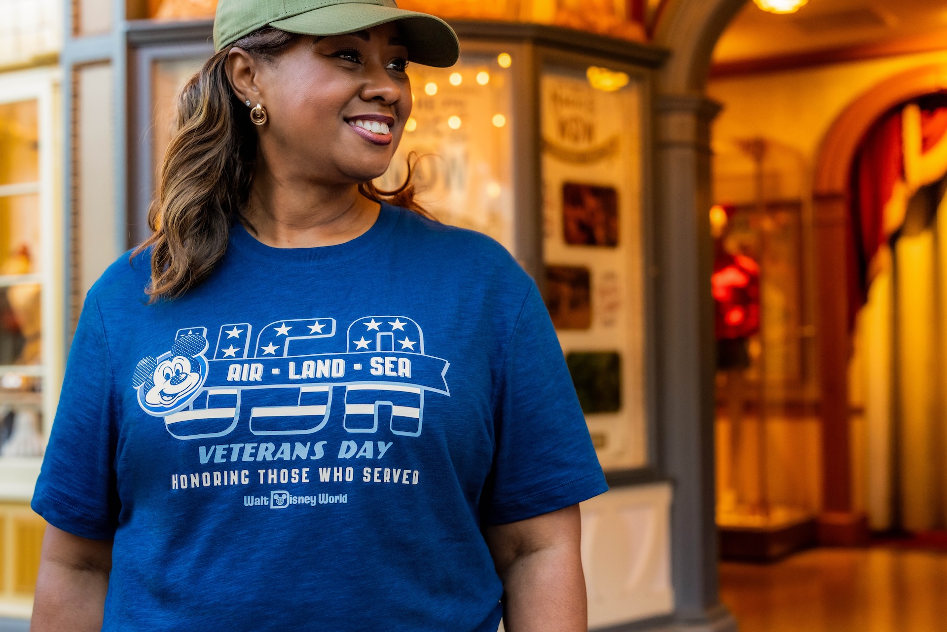 A model wears the blue Disney Veterans Day T-shirt