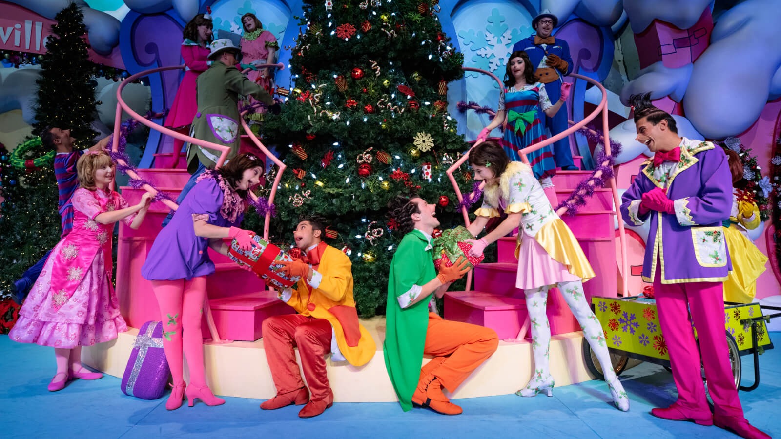 Cindy Lou and the Whos exchange gifts during the Grinchmas Who-liday Spectacular