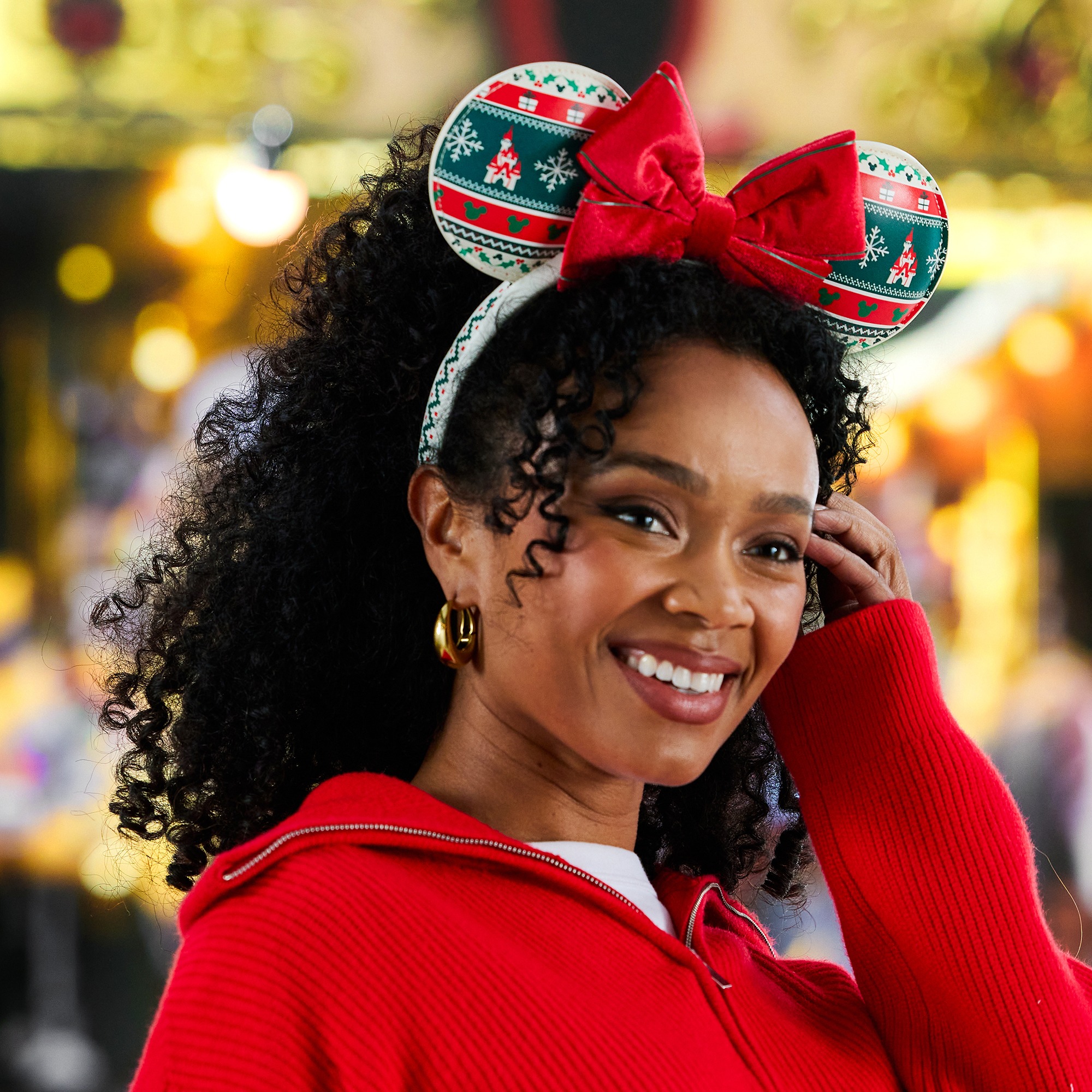 A model wears the Minnie Mouse Fair Isle holiday ear headband