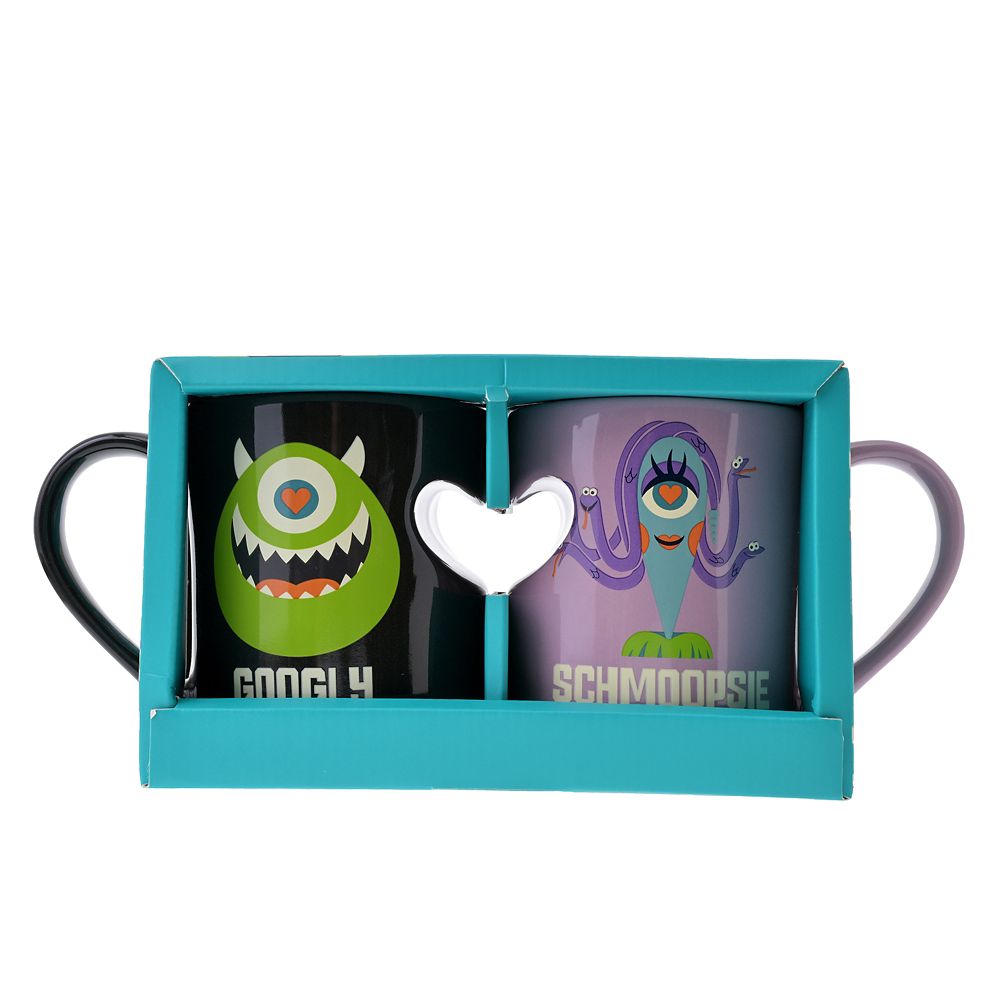 Mike and Celia mugs inside their display box