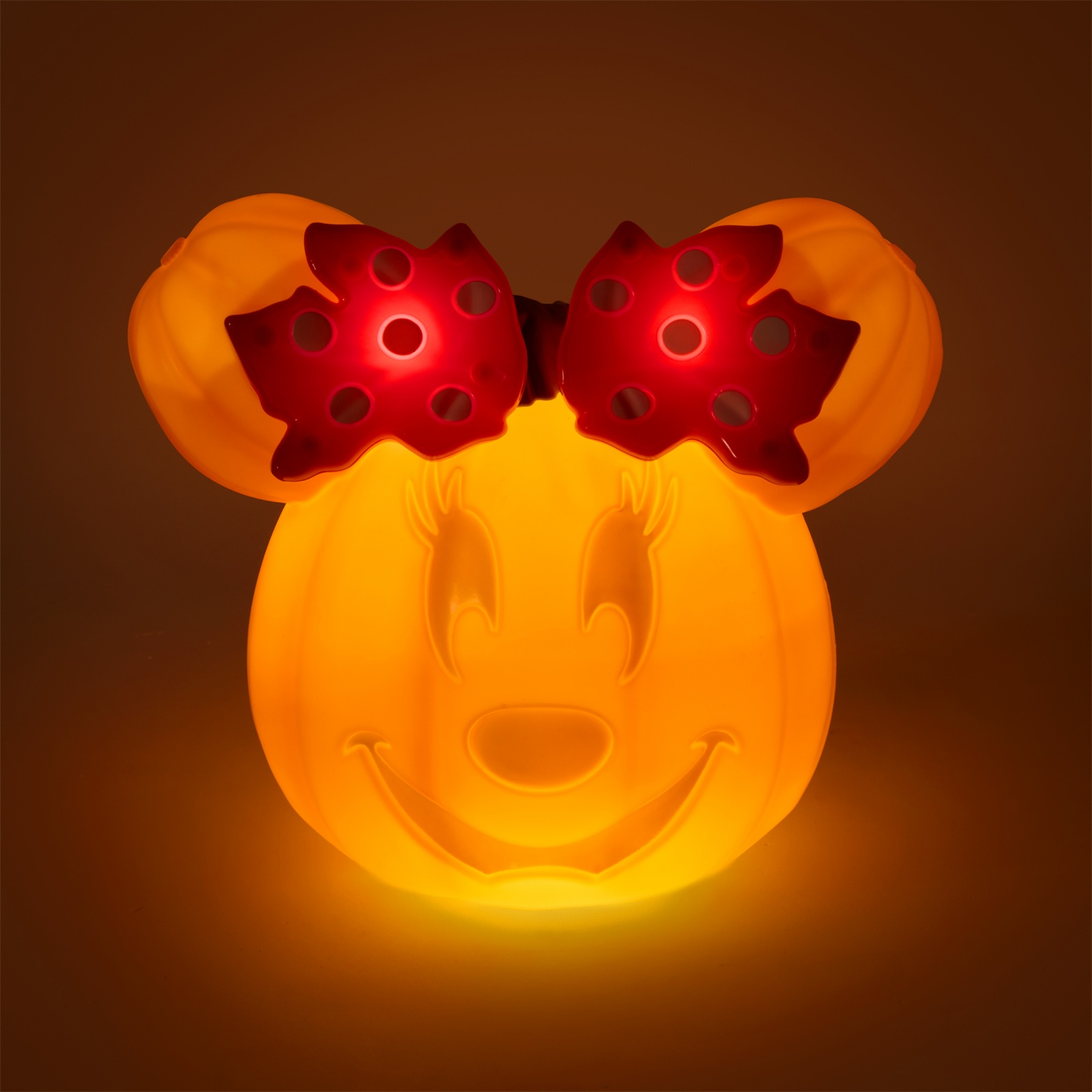 Minnie Mouse light-up jack-o’-lantern glowing in the dark