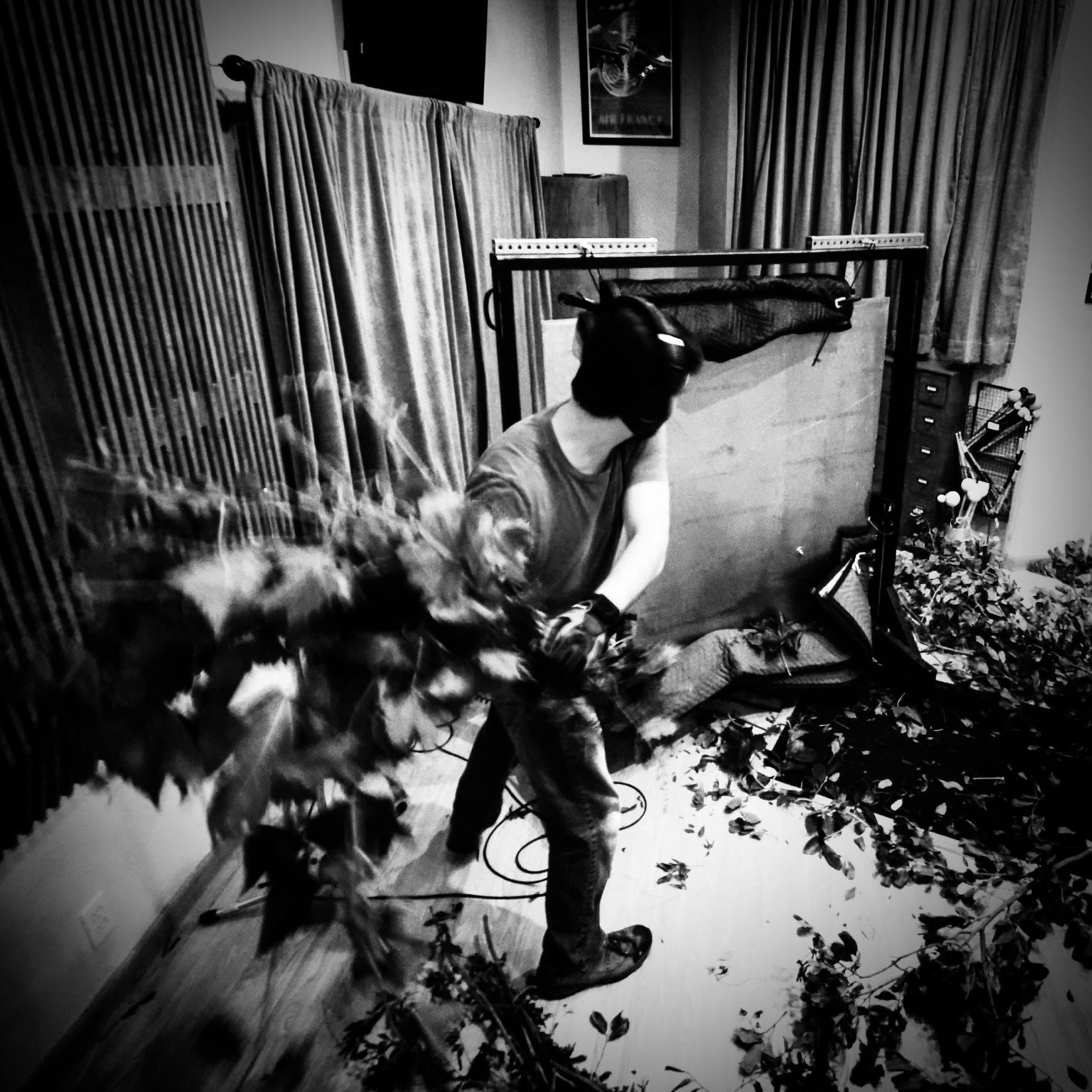 A Sound Sculpture artist records foliage movement effects inside the studio