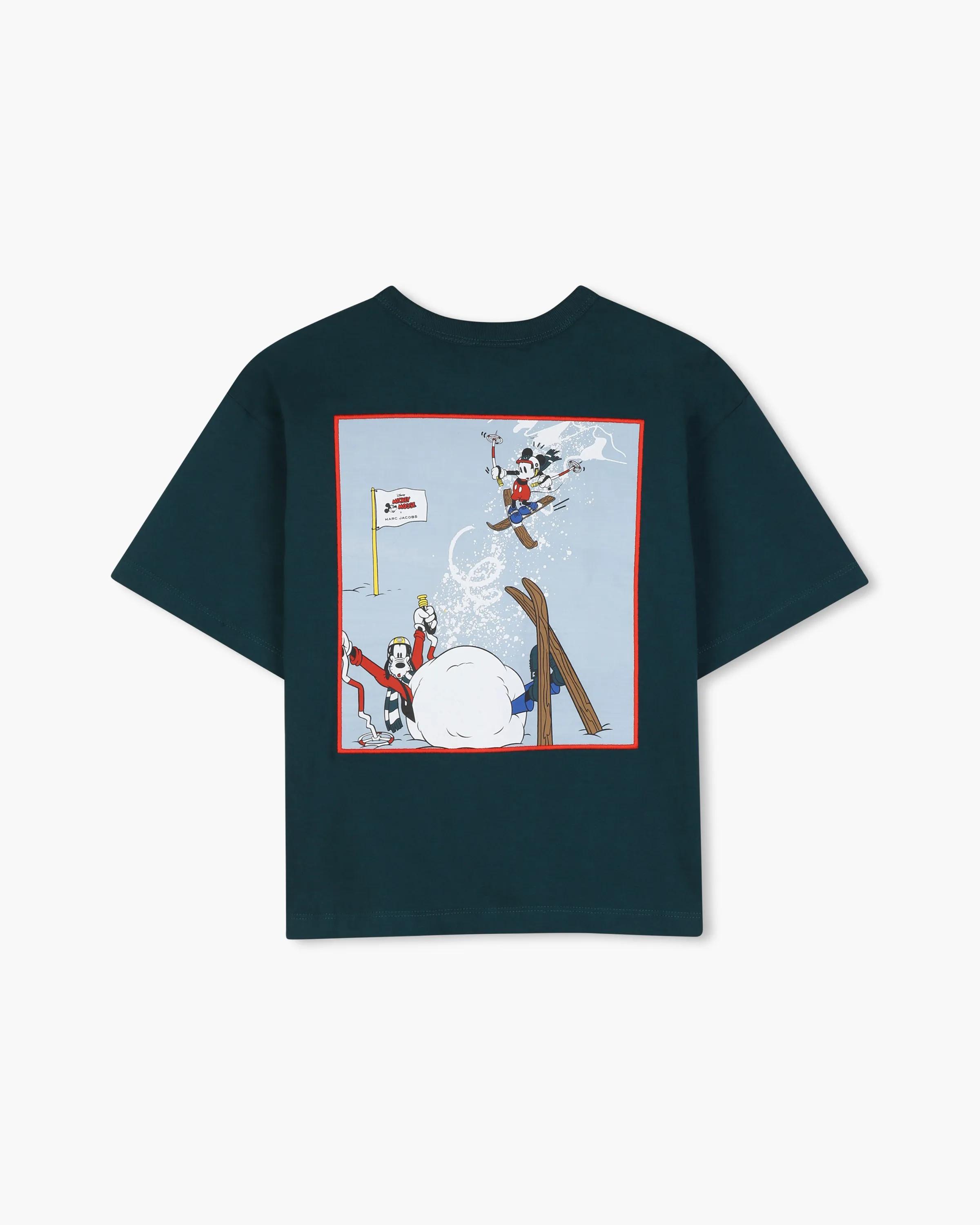 Back of a forest-green Marc Jacobs kids’ T-shirt with Mickey Mouse skiing over a snow scene