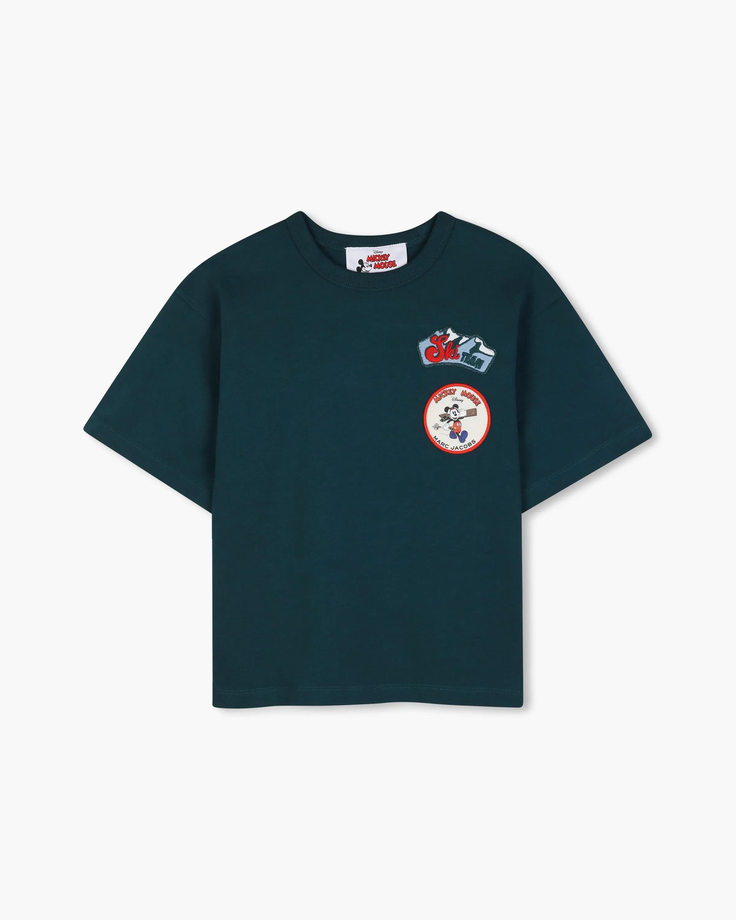 Front of the forest-green Marc Jacobs Mickey Ski T-Shirt with two chest patches