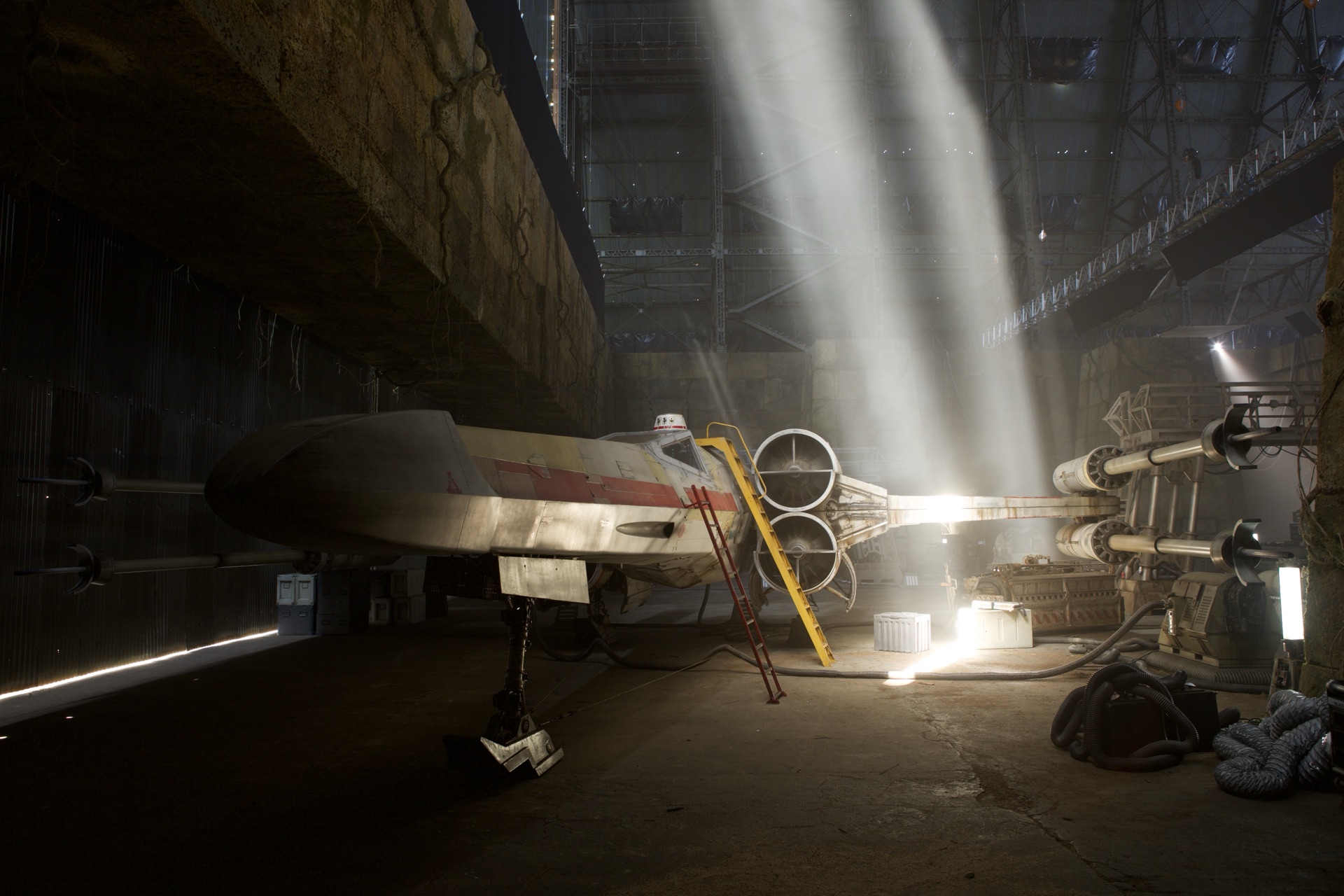 A Star Wars starfighter rests inside a production stage