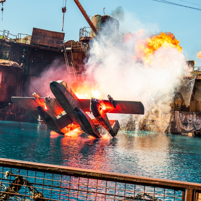 The WaterWorld plane-crash stunt lands amid fire and spray at Universal Studios Hollywood