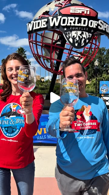 Two runners display red and turquoise Wine & Dine participant shirts outside ESPN Wide World of Sports Complex