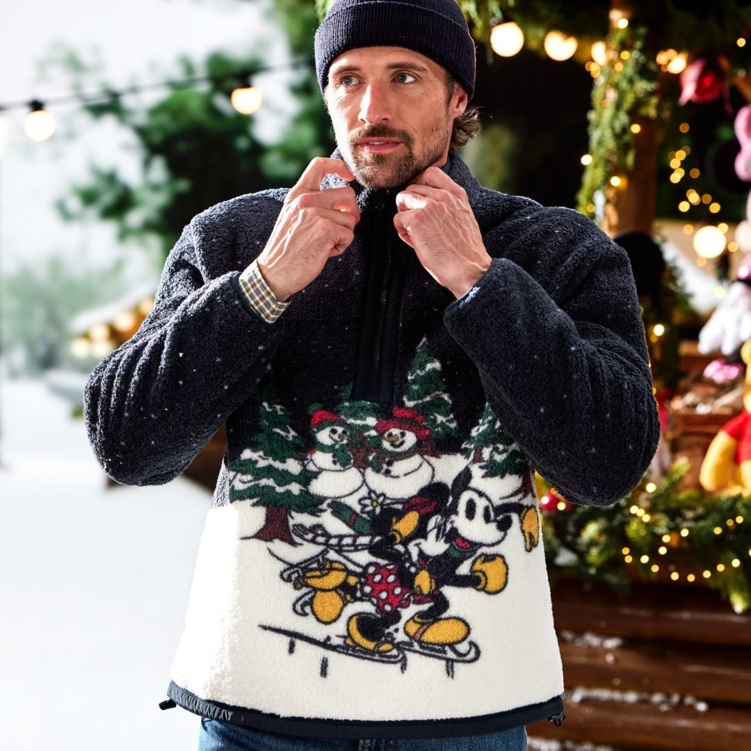 Model wearing the Mickey and Minnie faux shearling holiday quarter-zip jacket