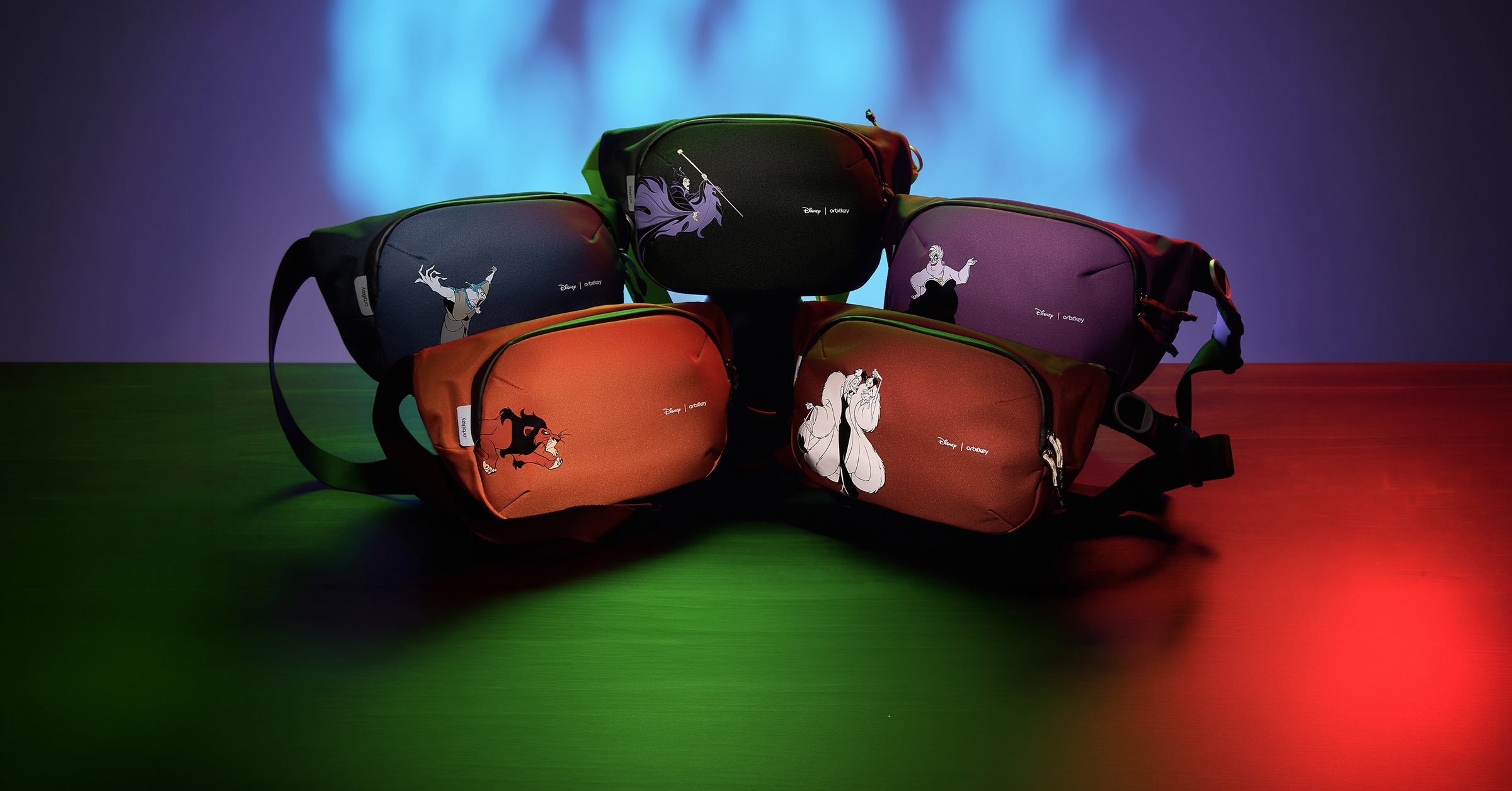 All five Disney Villains Urban Slings together under colored light