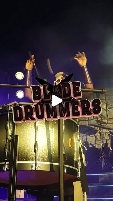Masked Blade Drums performer behind a large drum at SCarowinds