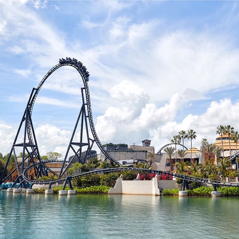 Jurassic World VelociCoaster track rising above the lagoon at Universal Islands of Adventure