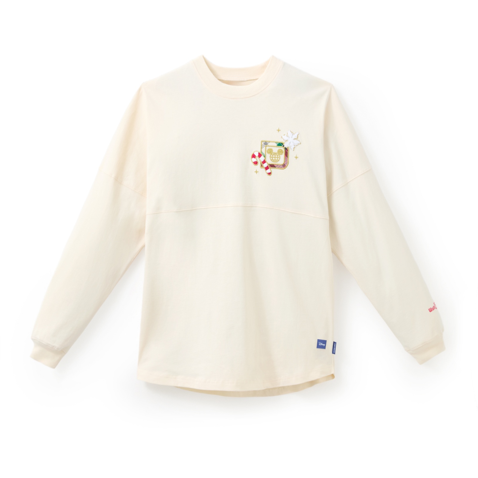 Front of the cream Walt Disney World Christmas Spirit Jersey with a holiday D icon on the chest