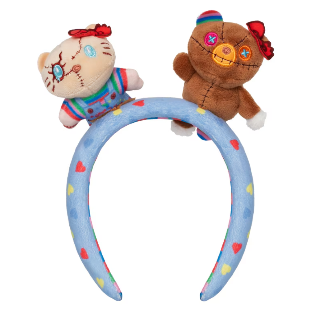 Hello Kitty and Tiny Chum plush figures in Chucky-inspired outfits on a red headband