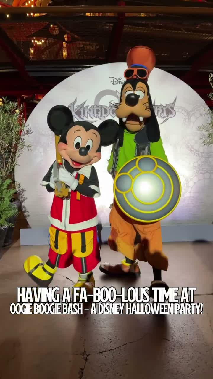 Mickey Mouse and Goofy wearing Kingdom Hearts costumes at Oogie Boogie Bash