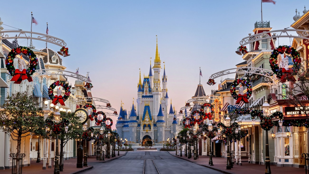Main Street, U.S.A. decorated for the holidays with Cinderella Castle in the distance at Walt Disney World