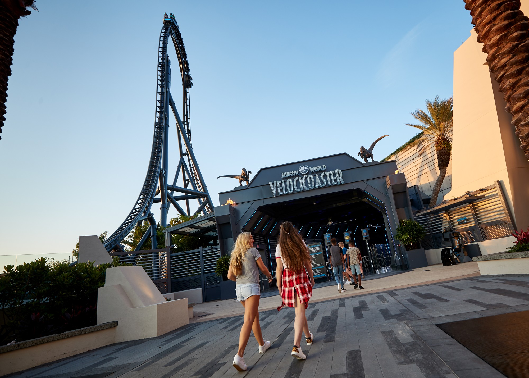 Jurassic World VelociCoaster racing through its track at Islands of Adventure