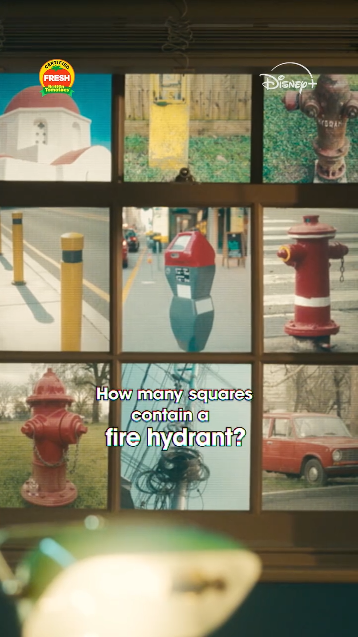 A CAPTCHA image grid asks how many squares contain a fire hydrant in Marvel Studios’ VisionQuest clip