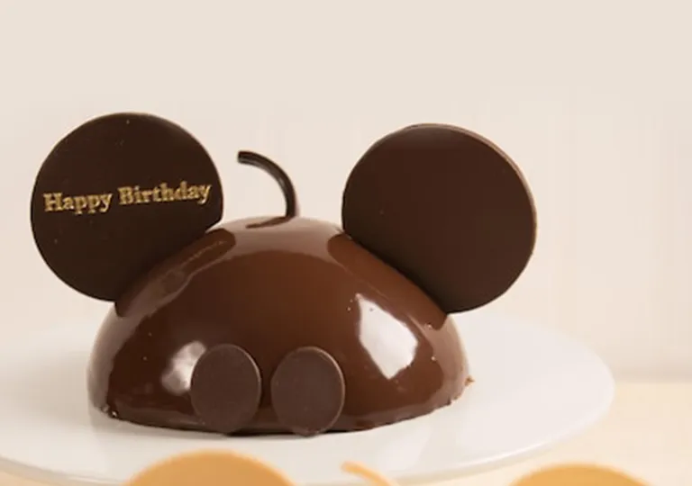 Mickey Mouse celebration cake available at participating Disney World restaurants