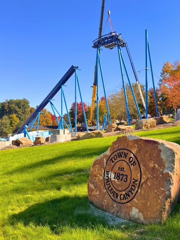 A crane installs the highest Cannonball track section at Holiday World