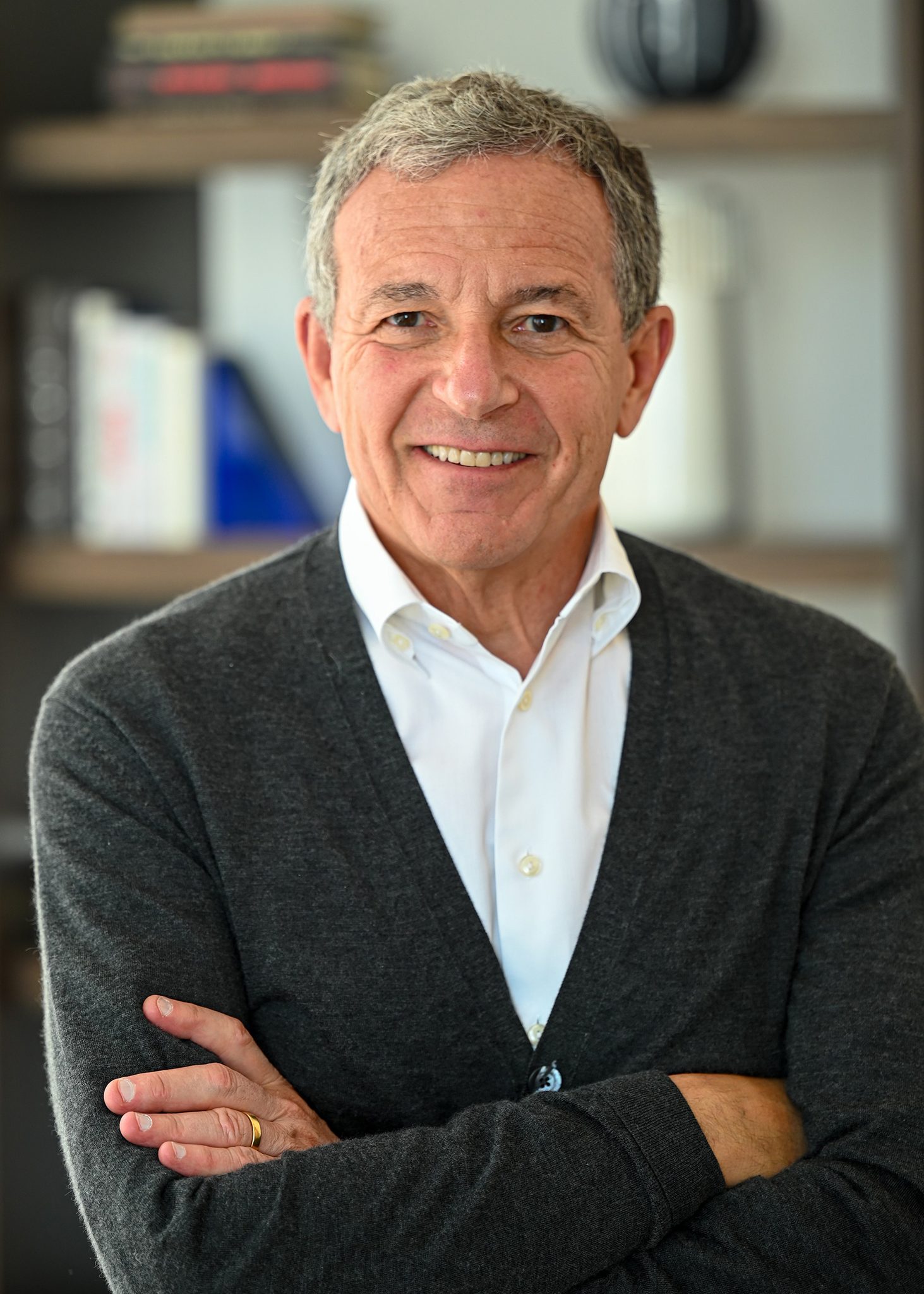 Bob Iger in a dark suit against a gray background