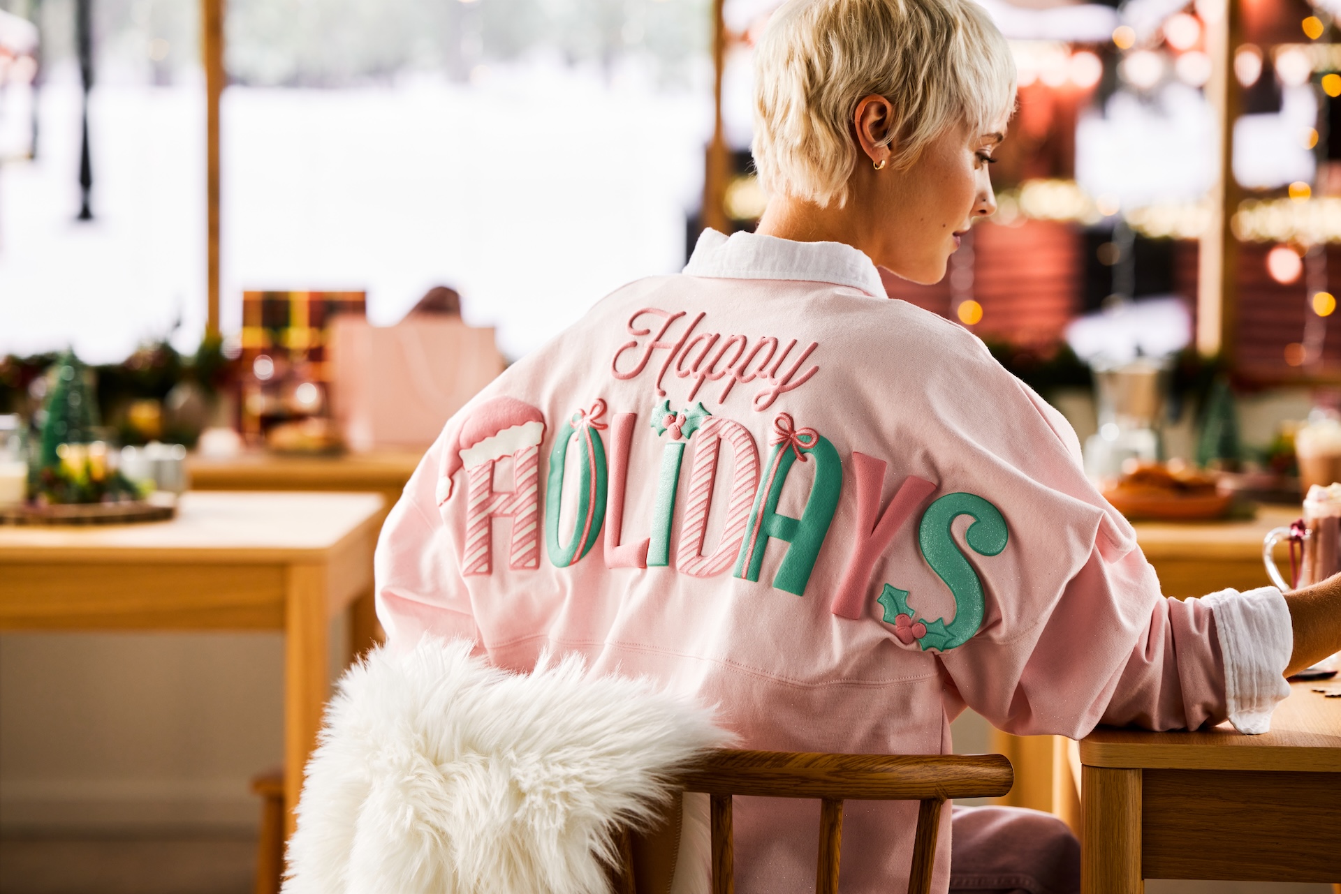 Pink Disney Holiday Pastel jacket with raised Happy Holidays lettering
