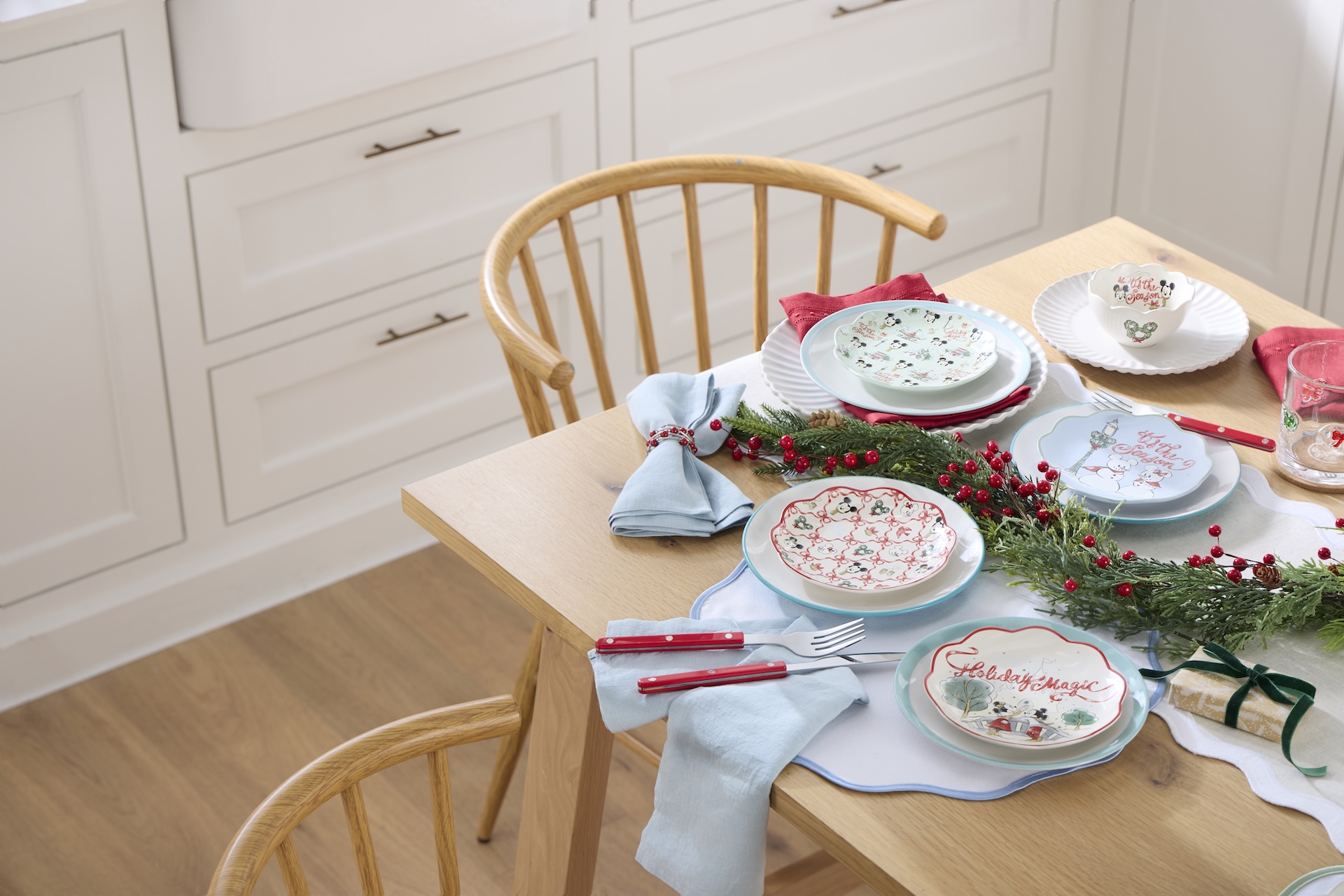 Disney Winter Wishes table setting with Mickey and Minnie snowmen