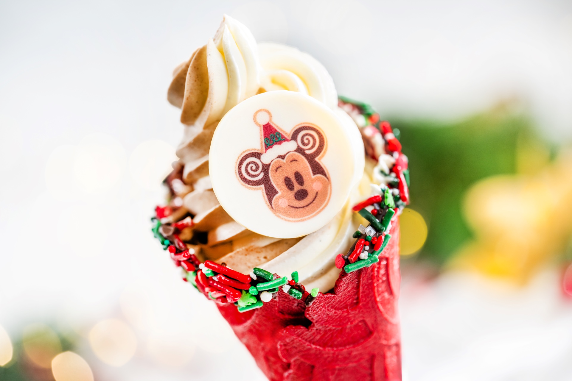 Gingerbread Mickey Cone with gingerbread and vanilla soft serve in a red velvet cone