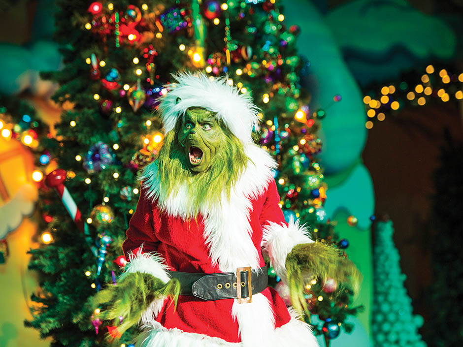 The Grinch in a Santa suit during Grinchmas at Universal Orlando