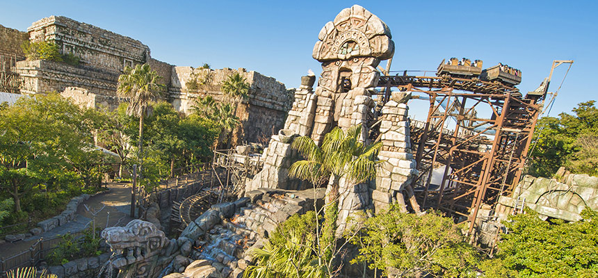 Raging Spirits trains racing through the ruins at Tokyo DisneySea