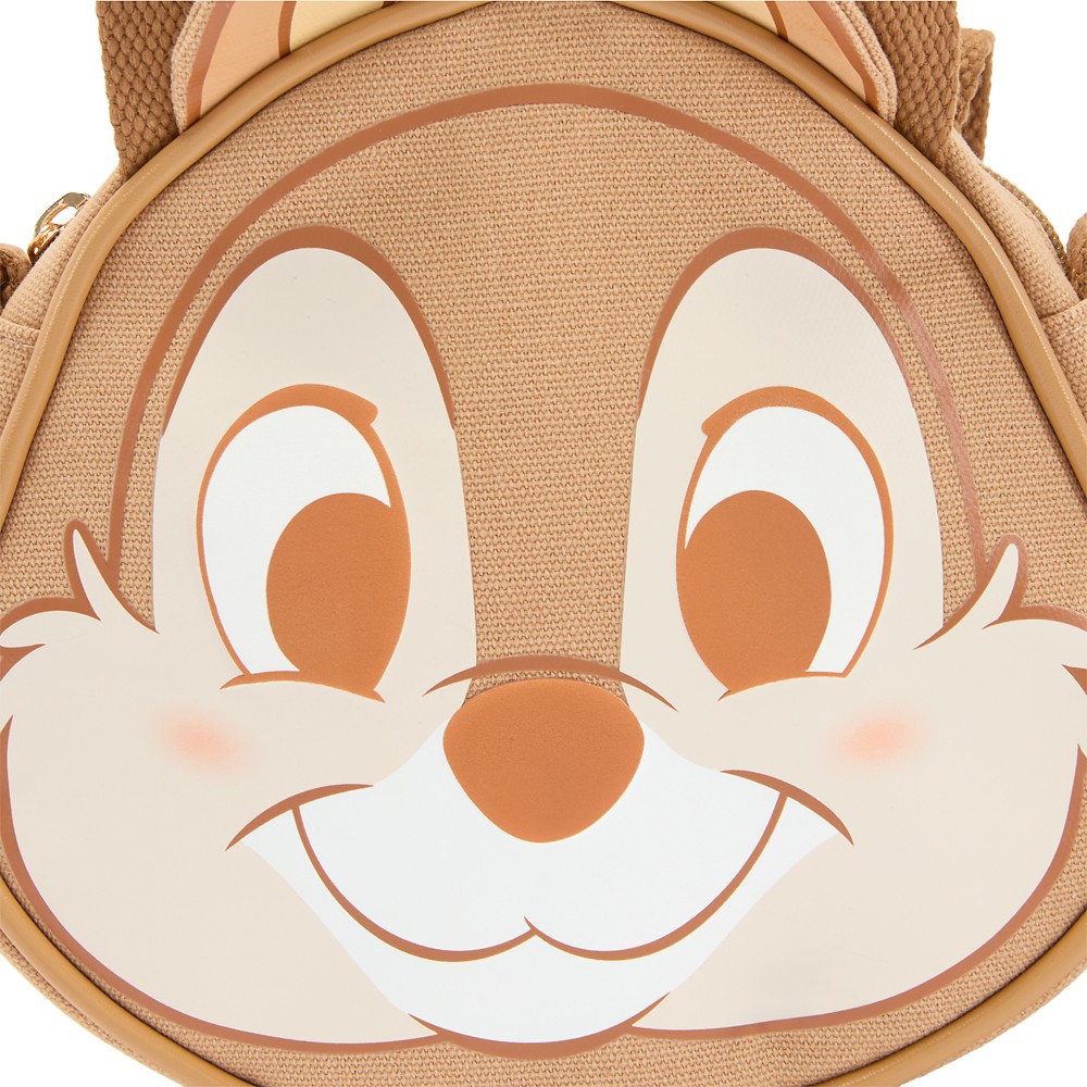 Close view of Chip's raised face details on the canvas bag