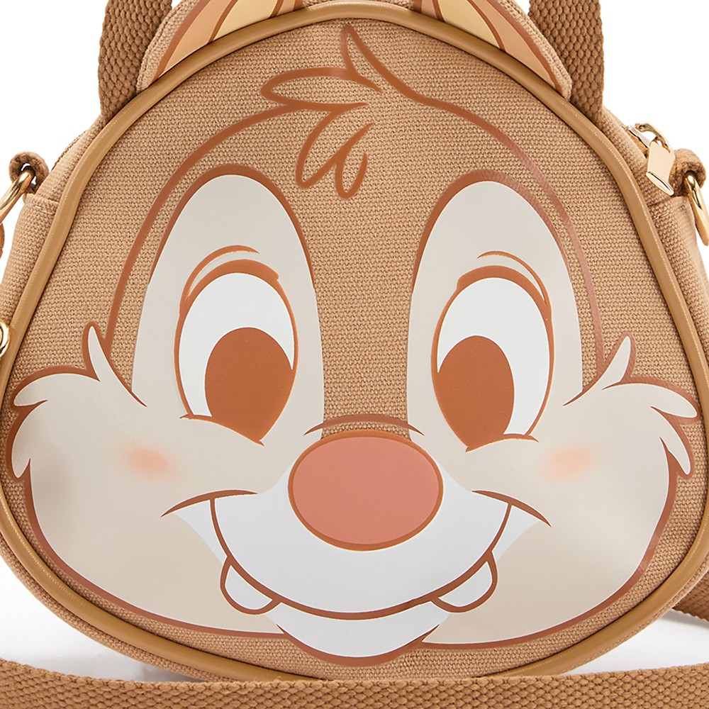 Close view of Dale's raised face details on the canvas bag