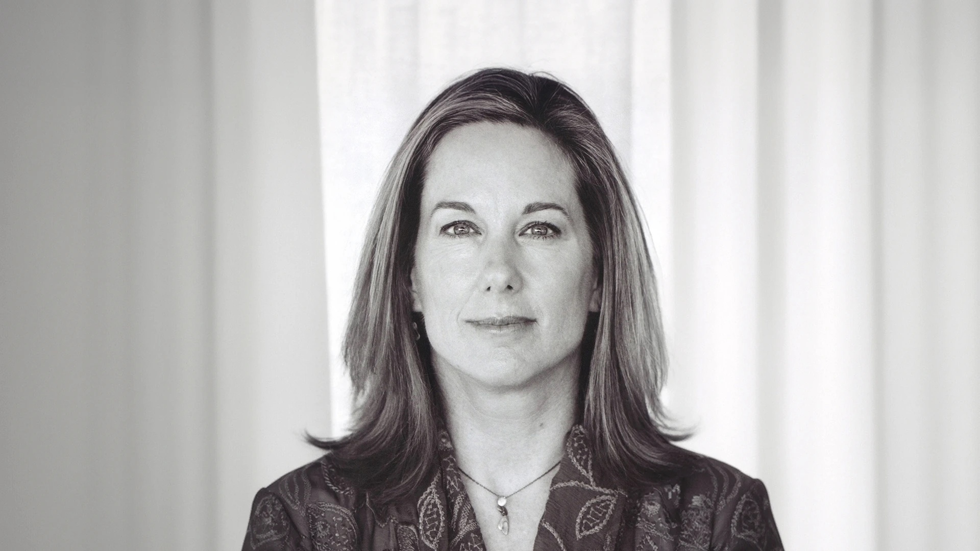 Black-and-white portrait of film producer Kathleen Kennedy