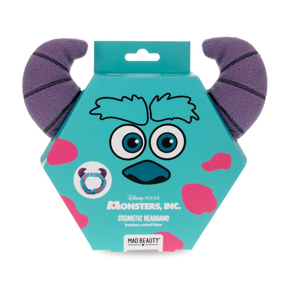 Side view of the Sulley cosmetic headband and plush purple horn