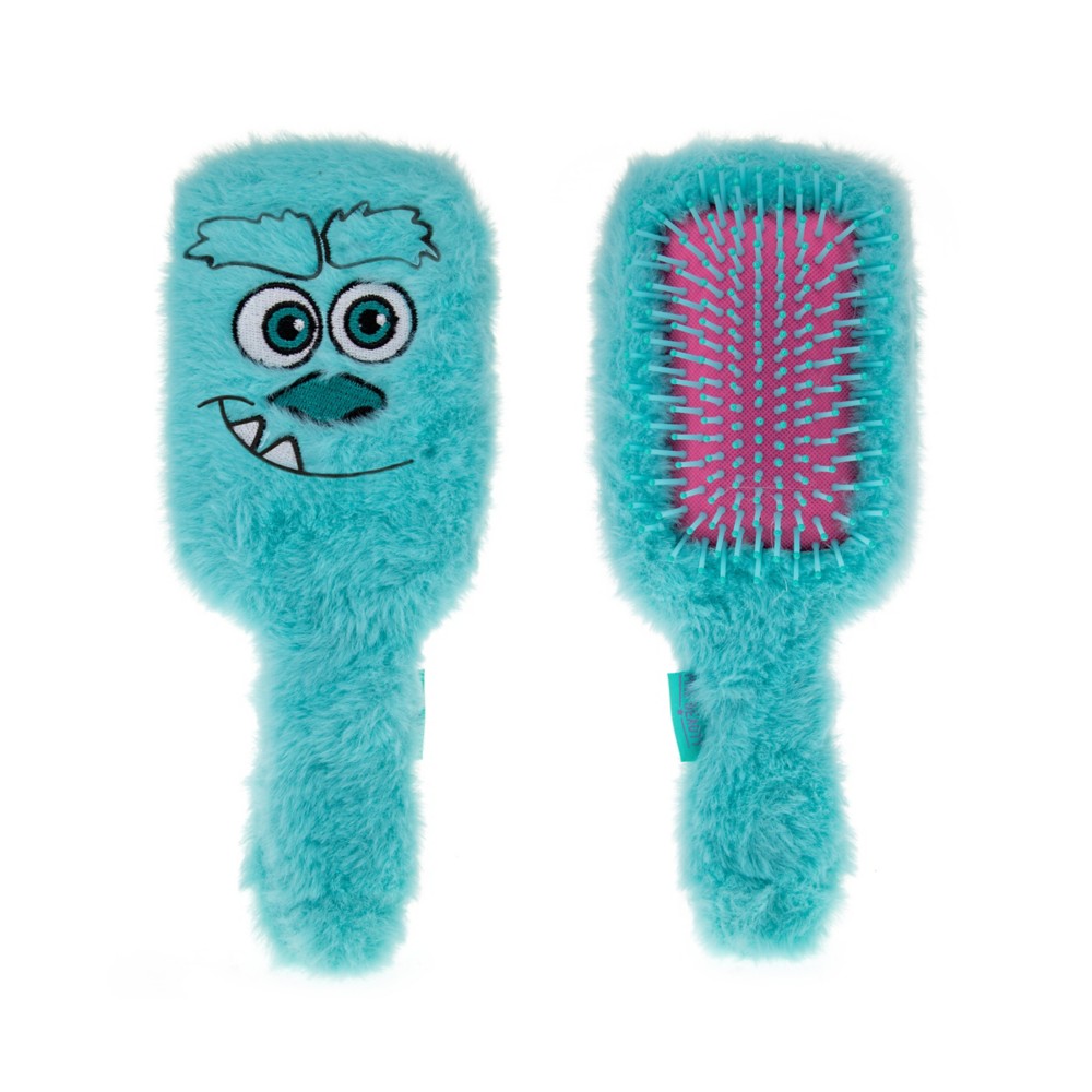 Front and back views of the fuzzy blue Sulley paddle hairbrush