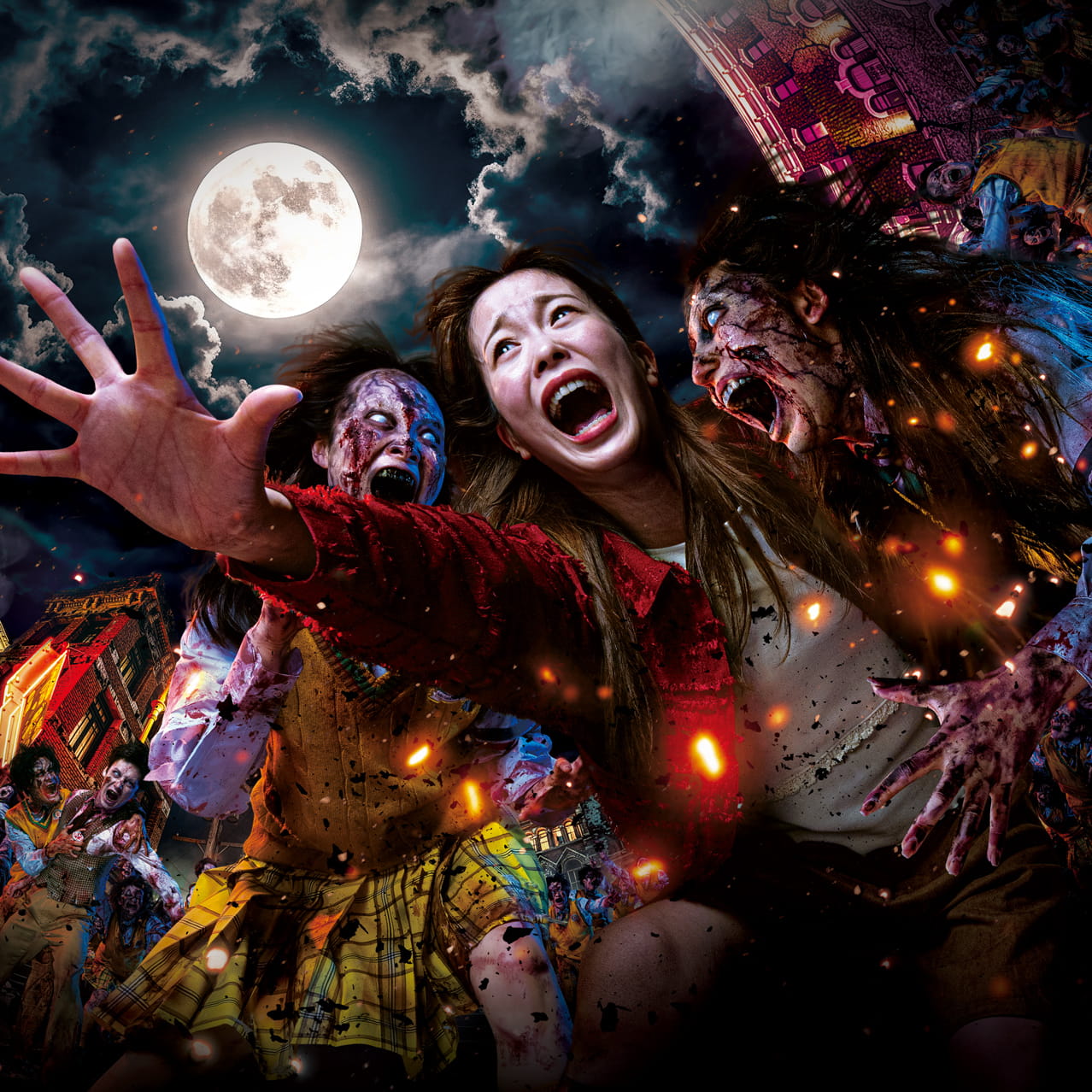 Street Zombies performers surround a frightened guest at Universal Studios Japan