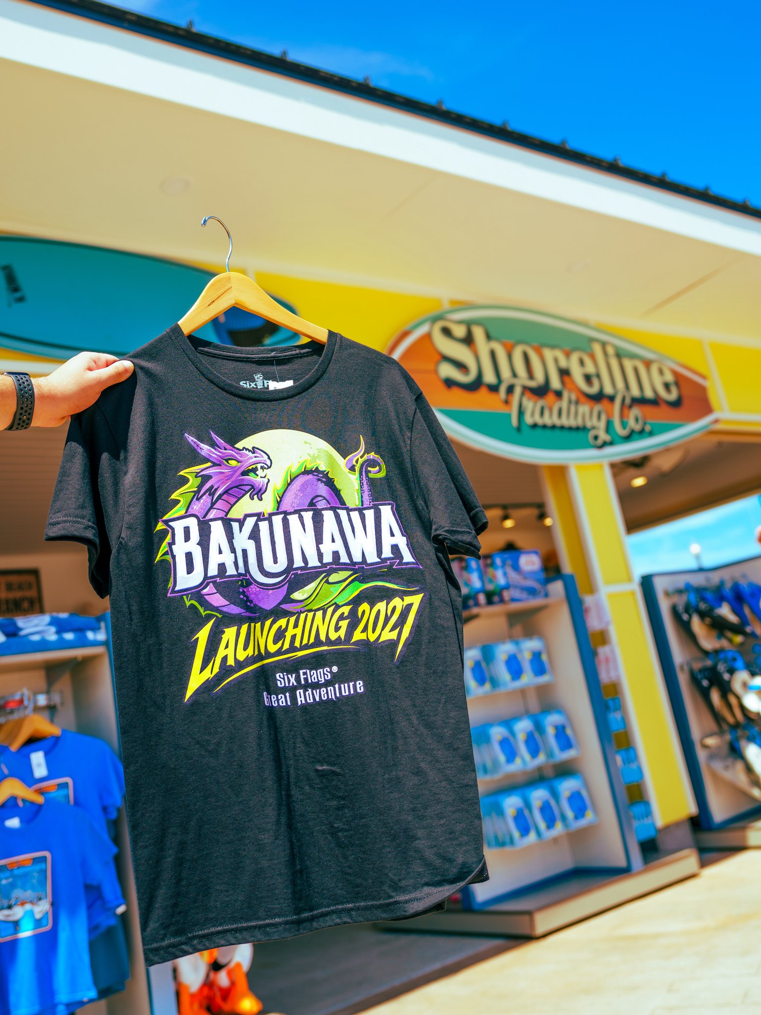 Black Bakunawa Launching 2027 shirt outside Shoreline Trading Company