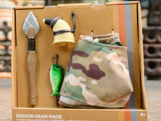 Endor Gear Pack with a spear, battle horn, grilled fish and Endor poncho