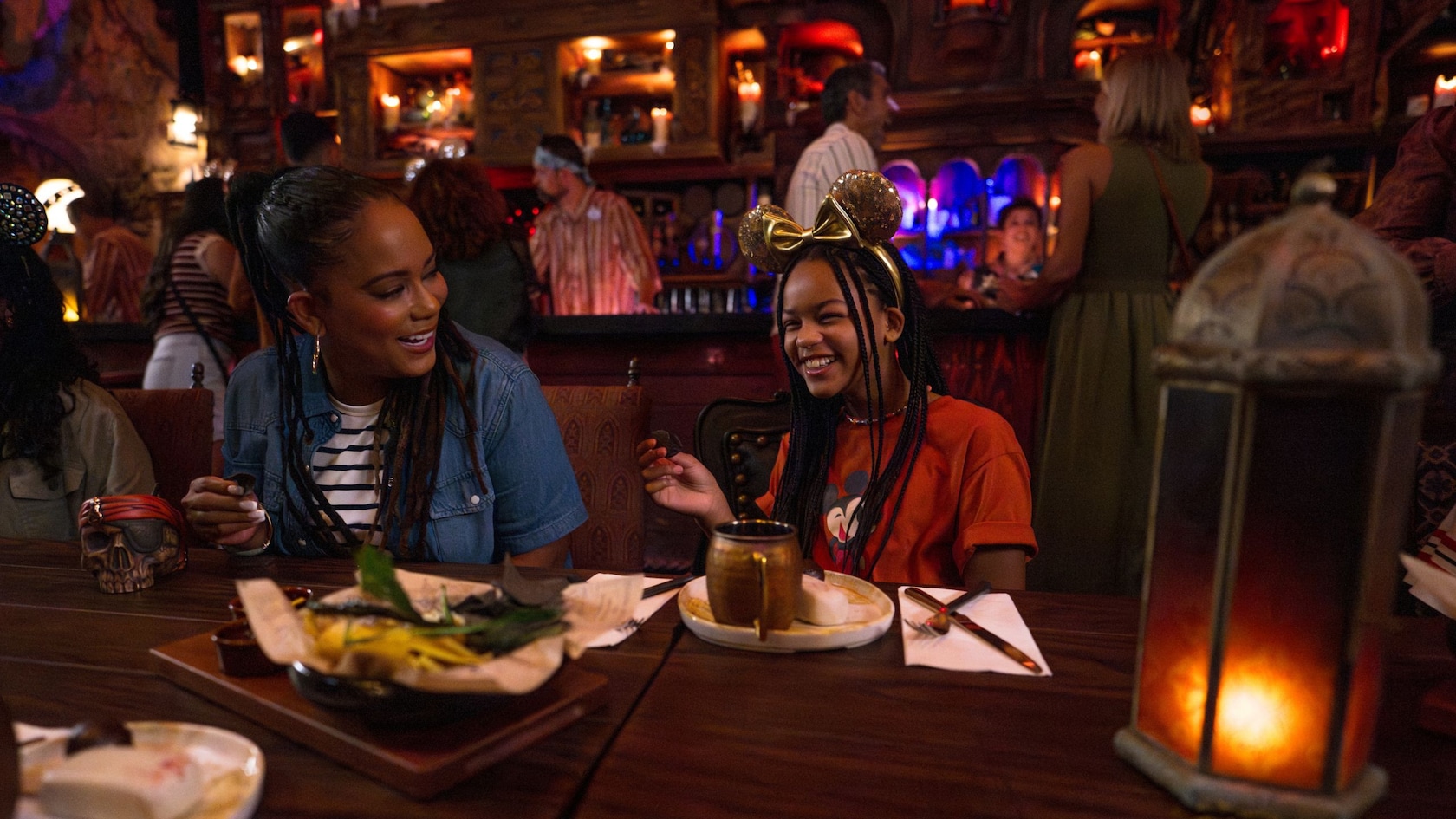 Guests seated at a table inside The Beak and Barrel