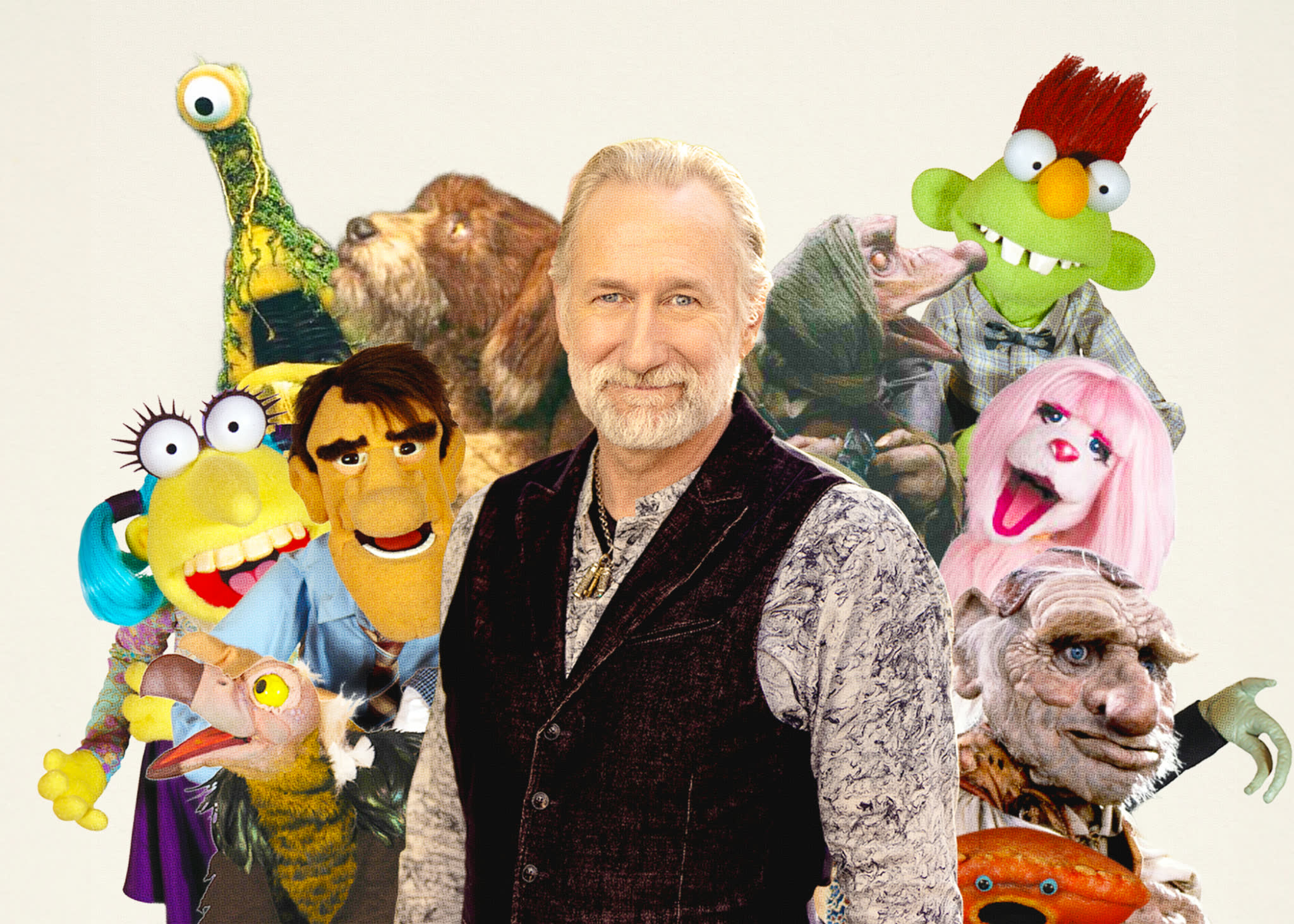 Brian Henson surrounded by puppets from Jim Henson Company productions