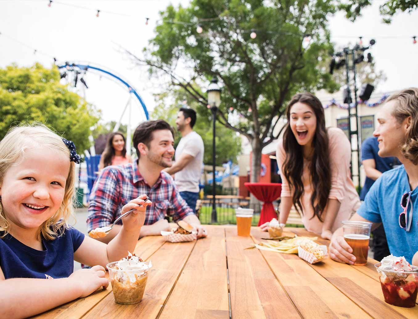 Family at a California's Great America Fourth of July cookout table
