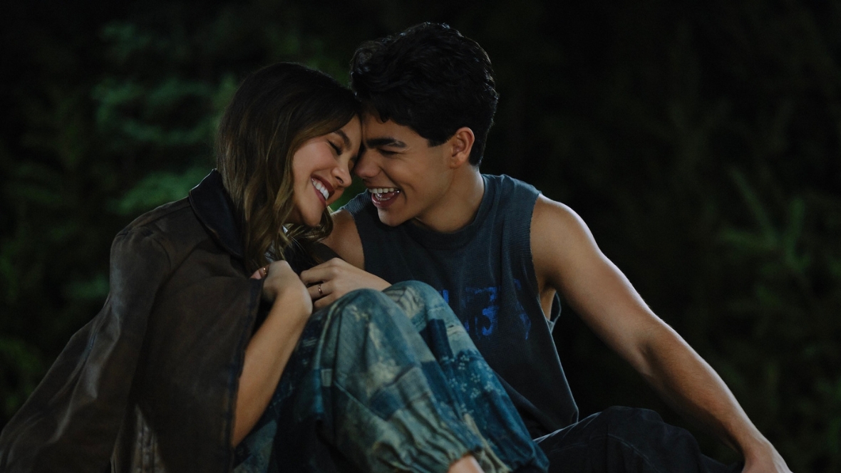 Sage and Fletch sit together at night in Camp Rock 3